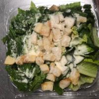 Caesar Salad · Romain  lettuce topped with Croutons,Parmesan cheese Served with pita and Caesar dressing 