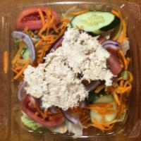 Tuna Salad · Iceberg lettuce topped with tuna,tomatoes,cucumber, red onions,green peppers, carrots.Served...