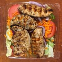 Chicken Kabob over Garden Salad · Iceberg lettuce topped with homemade marinated chicken,tomatoes,cucumber, red onions,green p...