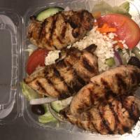 Chicken Kabob over Greek Salad · Iceberg lettuce topped with homemade marinated chicken,feta cheese, Greek olives,tomatoes,cu...