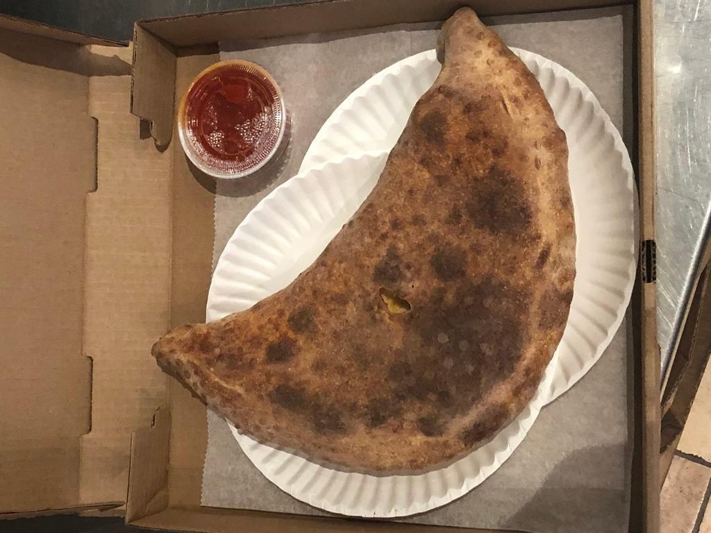 Super Etc Calzone · Mushrooms, onion, green peppers, pepperoni, sausage and black olives, mozzarella cheese and ricotta cheese with marinara sauce 
