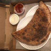 BBQ  CHICKEN Calzone · Home made diced chicken with BBQ sauce ,mozzarella and ricotta cheese 