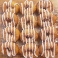 Cinnamon Sugar with Vanilla Frosting Mini Donut · Cinnamon sugar mini donuts with vanilla icing, dusted with cinnamon sugar!