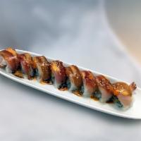 Sumo White Roll · shrimp tempura top w/ white tuna, hamachi, tobiko, unagi sauce, spicy mayo.