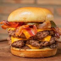 Bacon Cheeseburger · Grilled or fried patty with cheese on a bun.
