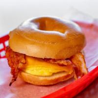2. Bacon, Egg and Cheese Bagel · Toasted, buttered plain bagel with bacon, egg, and American cheese.