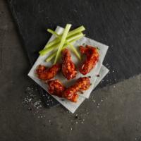 BBQ Chicken Wings · Breaded chicken wings tossed in buffalo BBQ sauce (5 Pcs)