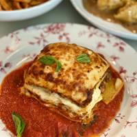 Beef Lasagna · Beef bolognese, bechamel, aged parmesan cheese, pomodoro sauce