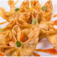 Crispy Crab Wontons · 6 pieces. Crabmeat, cream cheese, jalapenos, and green onions inside a lightly fried wonton ...
