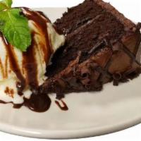 Sweet Street Chocolate Cake · Chocolate topped with vanilla ice cream and rich chocolate sauce.