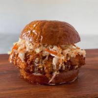 Ban Mi Fried Chicken Sandwich · Fried chicken, brioche bun, daikon carrot slaw, pickled cucumber, jalapeno, pickled red onio...