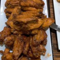 Chicken Wings · Served with Buffalo, BBQ or Cajun sauce.