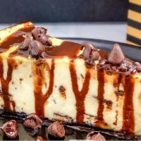 Chocolate Chip Cheesecake · Sweet and creamy cheescake with chocolate chips baked in, more chocolate chips, chocolate co...