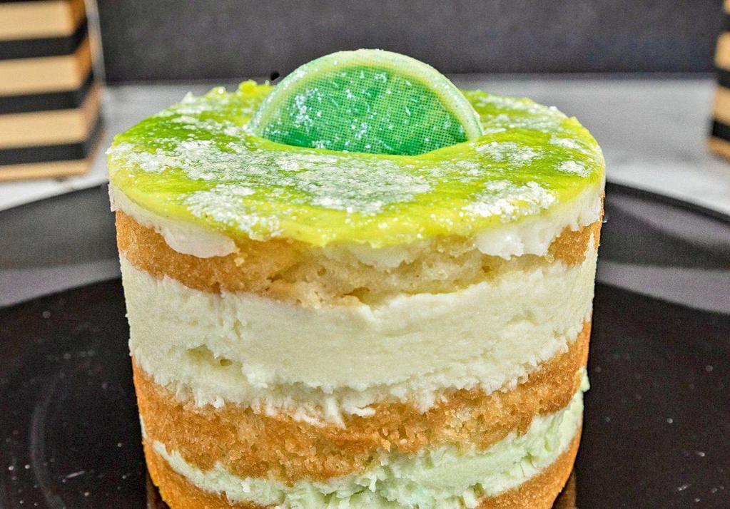 Key Lime Dream Cake  · White cake, lime mousse, cream cheese filling, white chocolate, key lime jelly