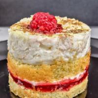 Raspberry Lemon Drop Cake  · Yellow cake, lemon mouse, raspberry preserve filling, lemon glaze, white chocolate