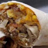 Hearty Breakfast Wrap · Bacon, Sausage, Fried Eggs, Cheddar Cheese, Sautéed Onions & Hashbrowns. *Served All Day
