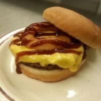 Rodeo Burger · American Cheese, an Onion Ring & BBQ Sauce.