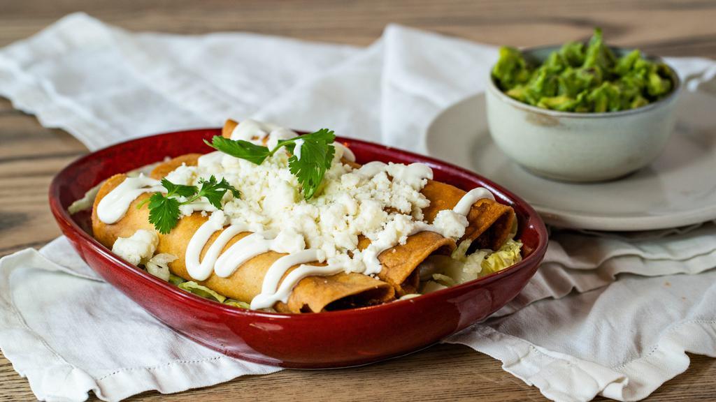 3 Chicken Flautas with Chef’s Guacamole · Shredded chicken and cheese rolled tortillas with chipotle sauce, lettuce, crema, queso fresco, and fresh guacamole.