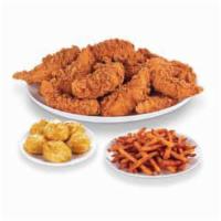 Chicken and Tenders Family Meal · 12 pieces chicken mix, 6 pieces Cajun tenders, 6 pieces biscuits, and family fries.