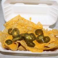 Nachos · Tortilla chips covered with nacho cheese and jalapenos.