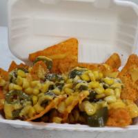 Dorinachos · Mexican doritos covered with nacho cheese, corn and jalapenos.