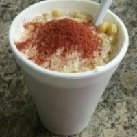 Corn in a Cup · Corn covered with mayo, Parmesan cheese and tajin.