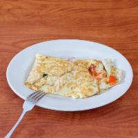 Vegetable Omelet · 3 eggs, tomatoes, onion peppers and mushrooms. Served with toast.