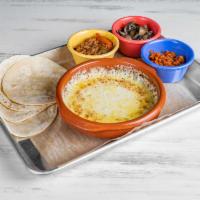 Queso Fundido · Mexican cheese blend, select your topping: plain-chorizo-mushroom.