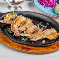 Alambre De Camaron Specialty · Grilled butterfly jumbo shrimp, chipotle marinated, and rosemary-thyme-lime butter. Served w...