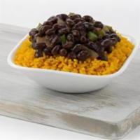 Rice & Beans · Where else are you going to get traditional black beans and yellow rice? Our black beans are...