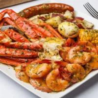 Snow Crab Legs · 1 cluster. All comes with 10 large shrimp (10 pieces), 1 corn (1 piece), and potato (pieces)...
