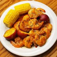 Boiled Shrimp · Boiled Shrimp with corn, potato, and additional side of the sauce.