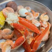 Combo A · 1 snow crab cluster, 1 lb. headless shrimp, 1 corn 1 potato 1 boiled.