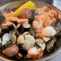 Combo B · 1/2 lb. clam 1 lb. headless shrimp, 1/2 lb. black mussel, 1 corn, 1 potato, 1 boiled egg.