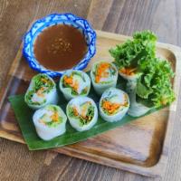Green Rolls · Green leaf, cucumber, carrot, rice noodles, topped with crisp garlic serve with special sauc...