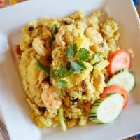 Pineapple fried Rice · Rice, egg, shrimp, chicken, cashews, pineapple, raisin, curry powder and scallions