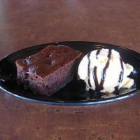 Kahlua Brownie with Ice Cream · One chocolate brownie with a choice of vanilla or bubble gum ice cream topped with chocolate...