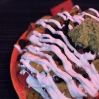 Macho Mary Nachos · Fresh tortilla chips topped with melted cheese, onions, black olives, jalapenos, sour cream,...