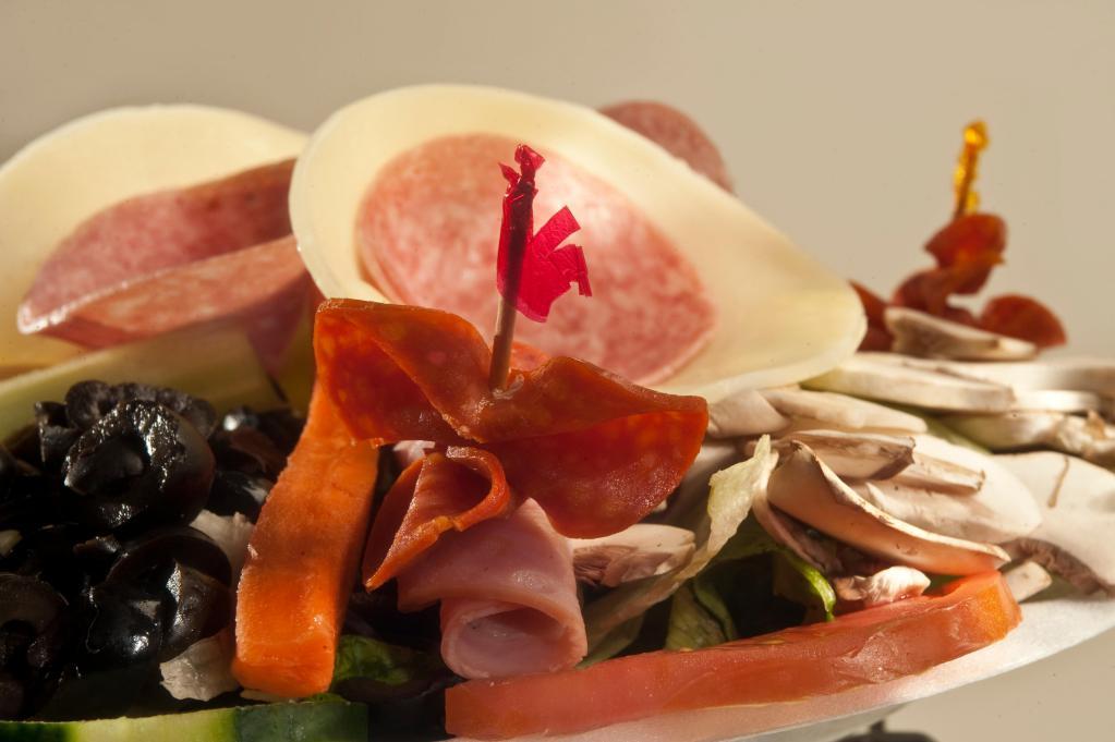 Antipasto Salad · Served with 1 side of dressing.