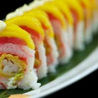 Tu Tu Mango Roll  · Mango and tuna on top, soy paper, masago, cream cheese, shrimp tempura, rice avocado, krab a...