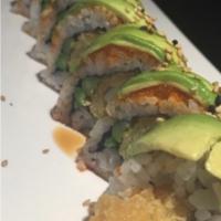 Dragon Roll  · Shrimp tempura, asparagus and avocado on top with eel sauce.