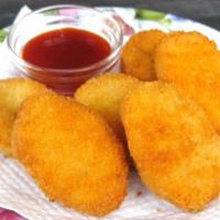 Kids Chicken Nuggets Meal · 5 pieces served with fries and small drink