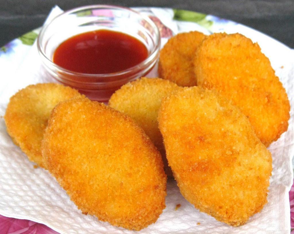 Kids Chicken Nuggets Meal · 5 pieces served with fries and small drink