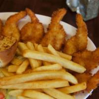 45. Camarones Empanizados · Ten breaded shrimp with french fries, salad and dinner roll. 