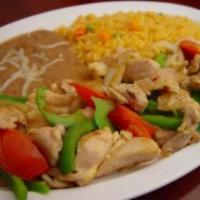46. Chicken Fajitas · Grilled strips of chicken mixed with tomatoes, onions, and bell peppers. Served with rice, b...