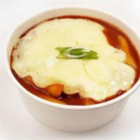 Cheese Spicy Rice Cake · Rice cake with Korean style spicy sauce with melted mozzarella cheese on top.