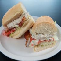 Chicken Salad Club Sub · Homemade chicken salad, lettuce, tomato and bacon served on a homemade sub roll.