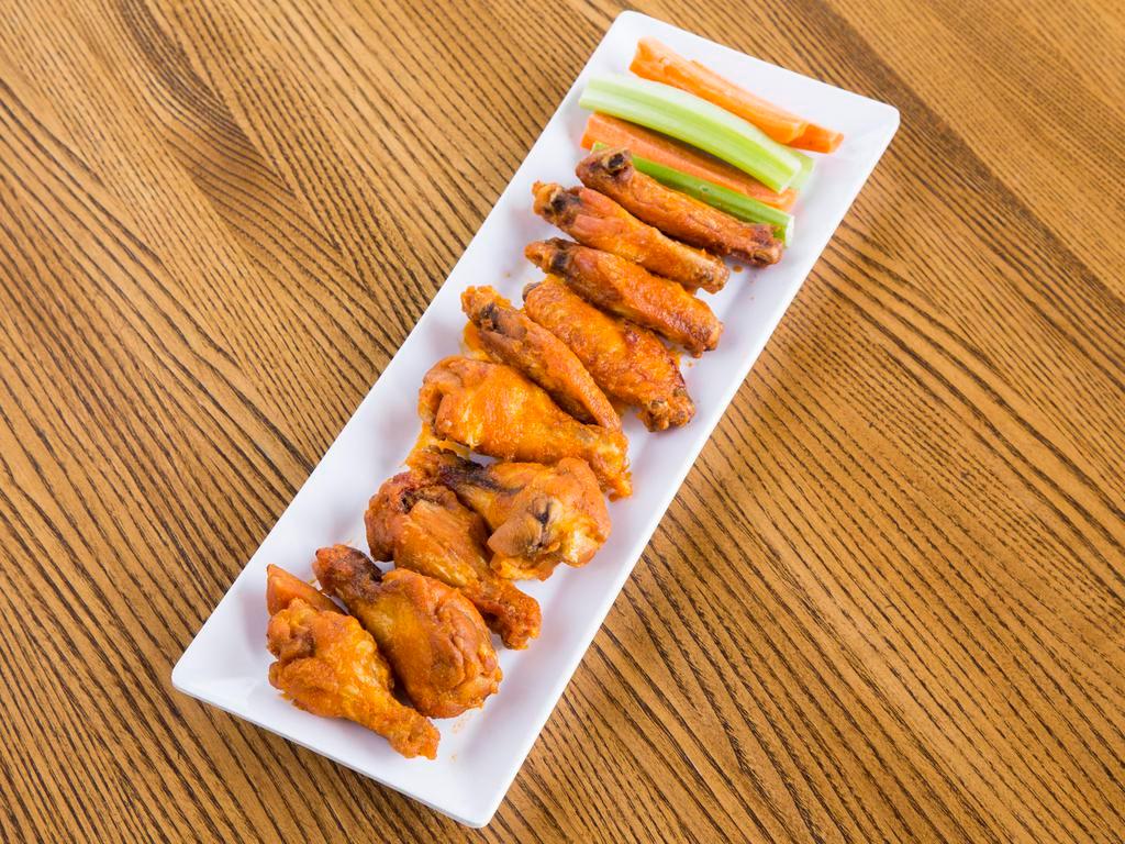 Chicken Wings · Choice of sauce. Served with celery, carrots and ranch dressing. Served with celery, carrots and ranch dressing. 10 wings per order.