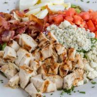 Cobb Salad · Sliced egg, tomato, bacon, avocado and blue cheese crumbles. Served on fresh tossed garden g...