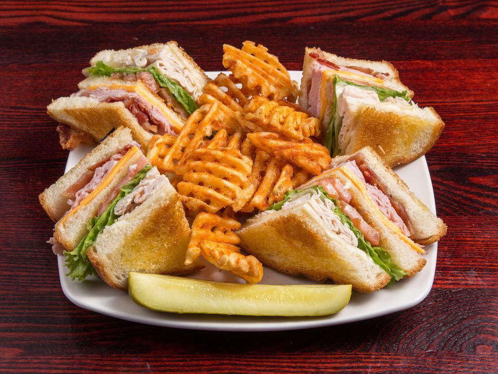 0'Sullivan's Classic Club Sandwich · Boar’s head ham and turkey with American and Swiss cheeses, bacon, mayo, lettuce and tomato. Served on toasted white bread.